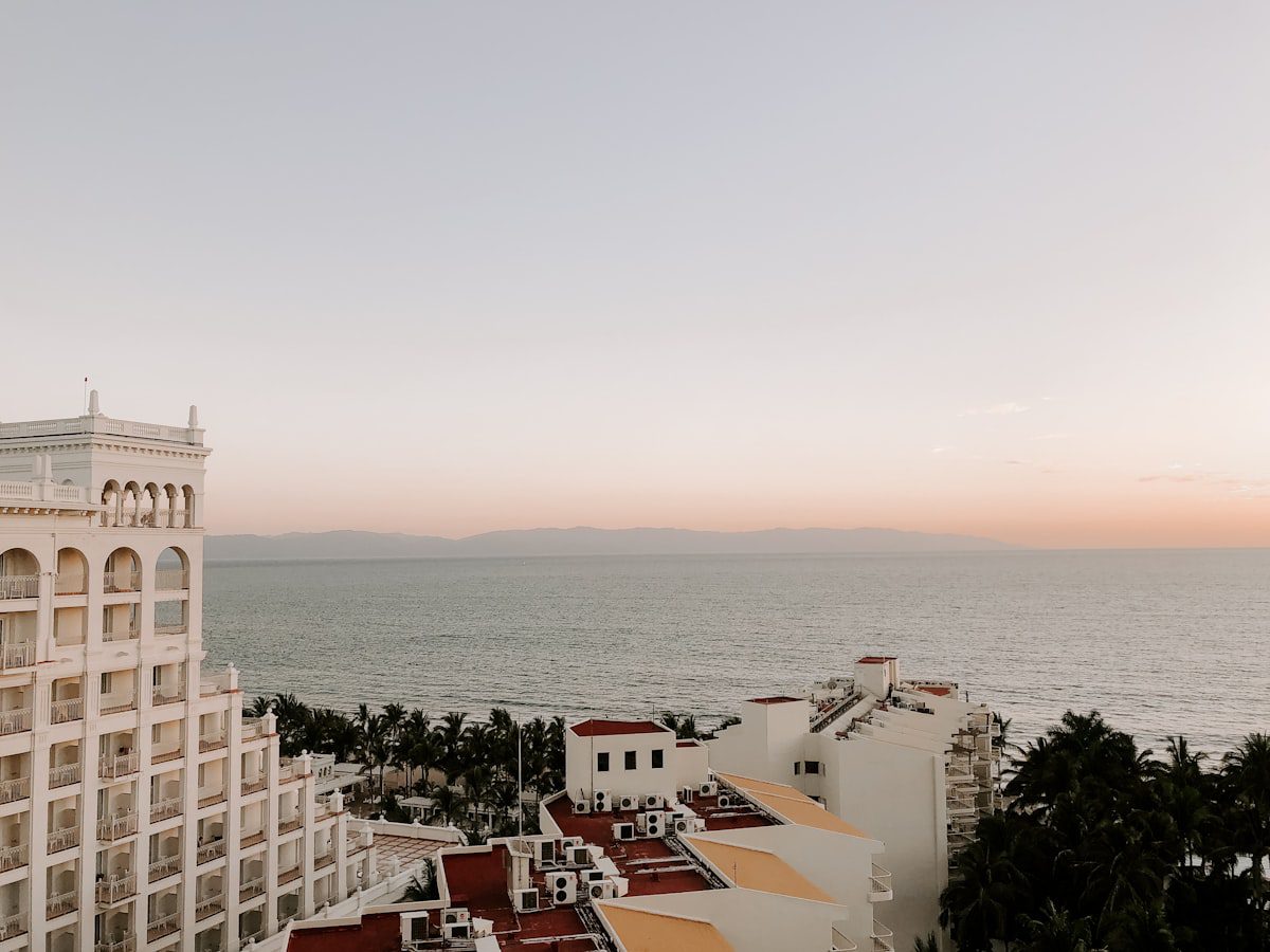 White Mediterranean buildings overlooking the sea on a sunny day