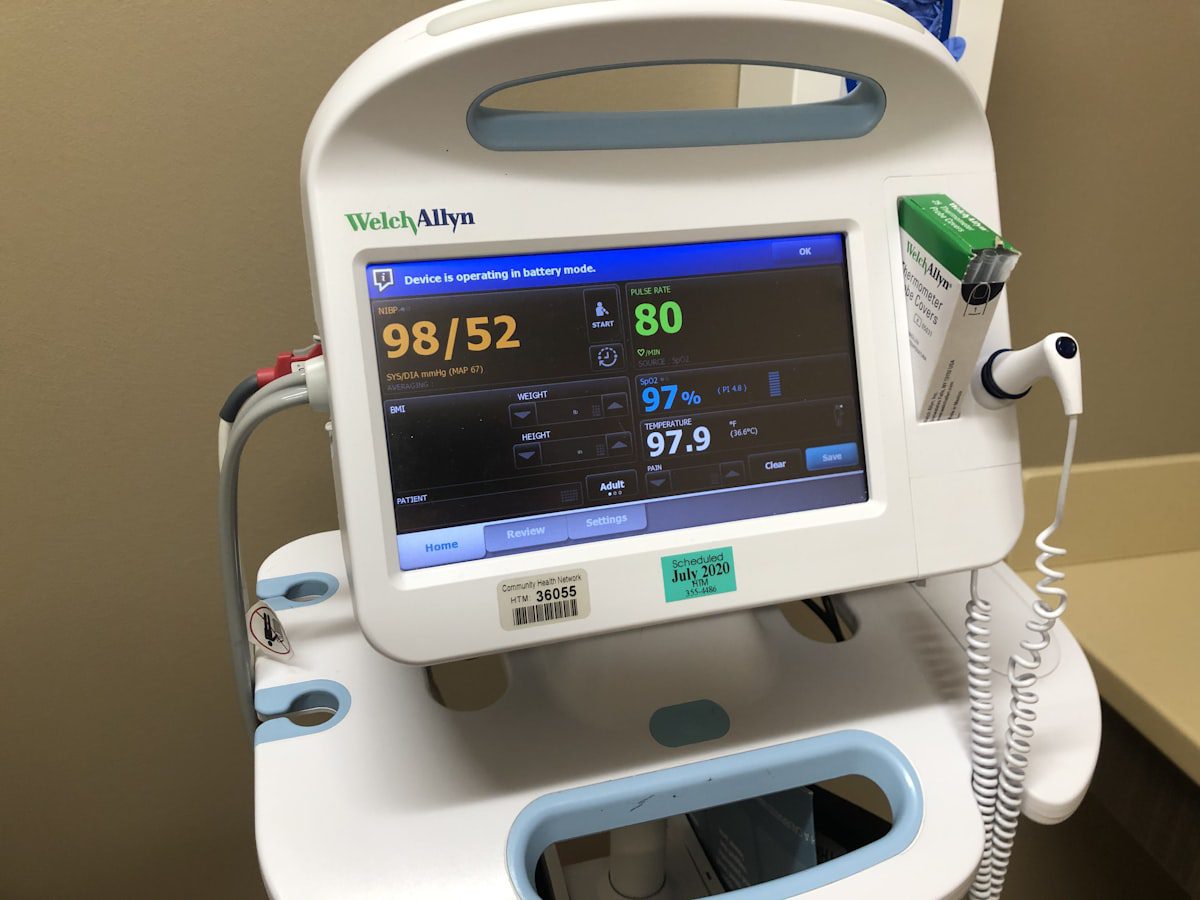 Welch Allyn vital signs monitor showing blood pressure and oxygen readings