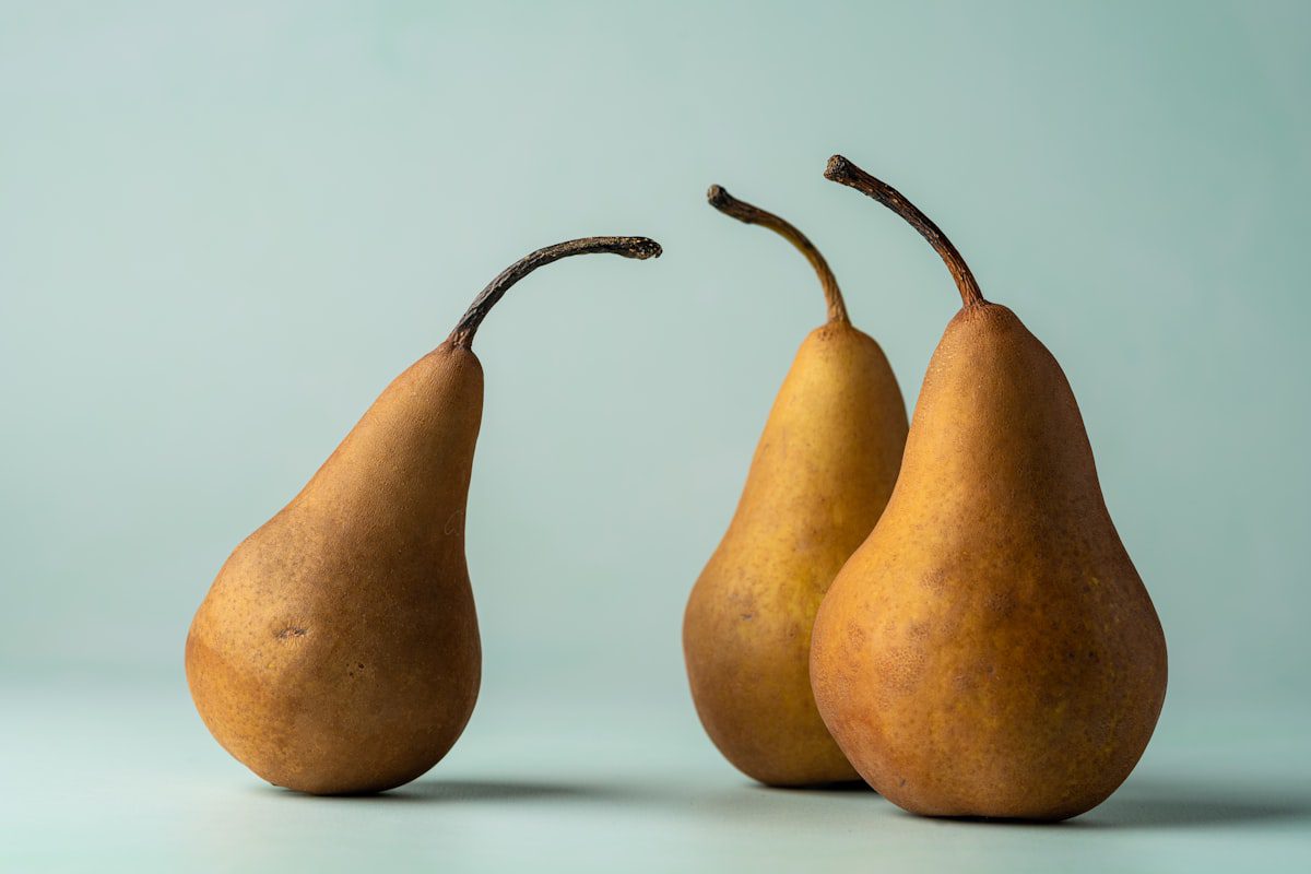 A group of ripe yellow pears