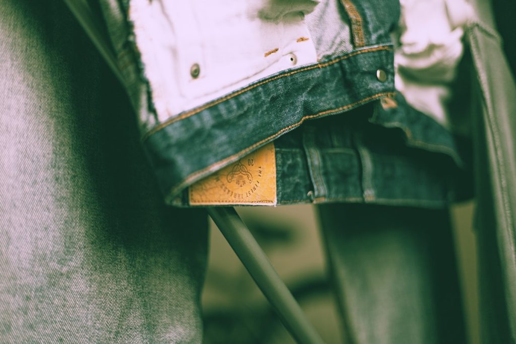 Close-up of a denim jacket label showcasing quality craftsmanship