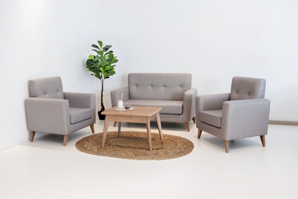 Modern living room set with designer chairs and sofa