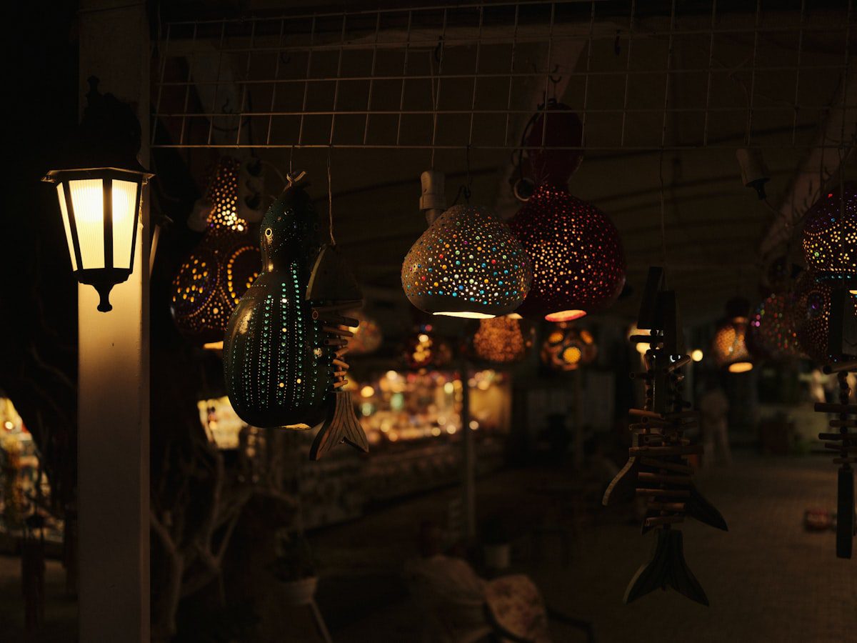 Decorative handcrafted lamps hanging in an artisan shop