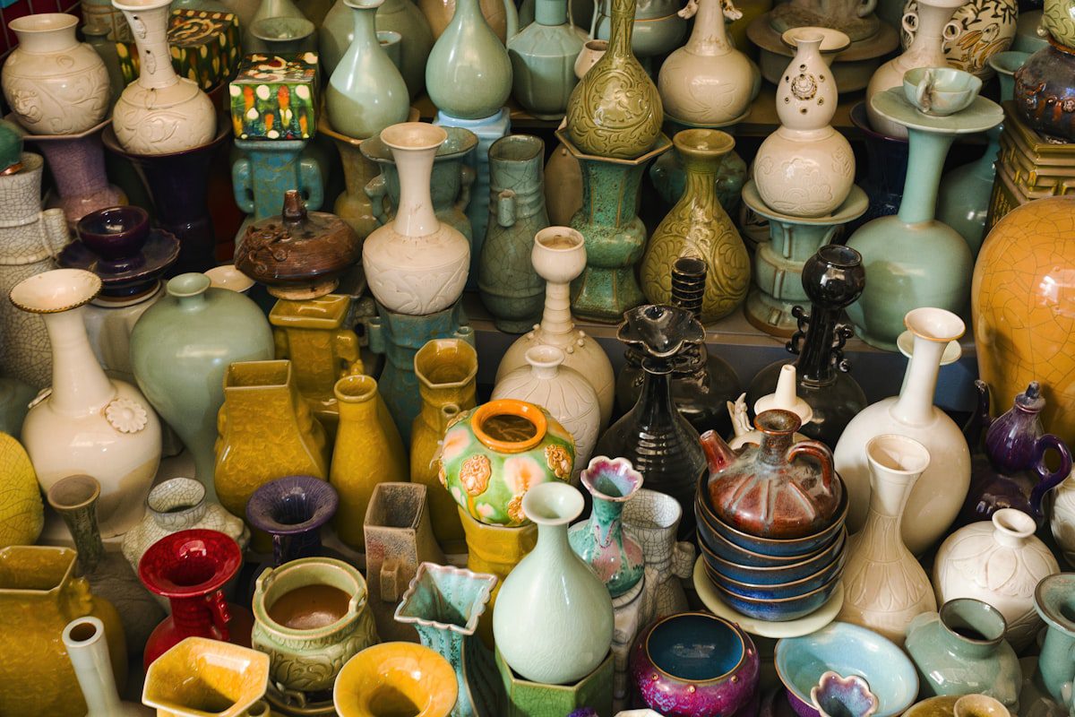 Collection of various handmade ceramic vases and pots